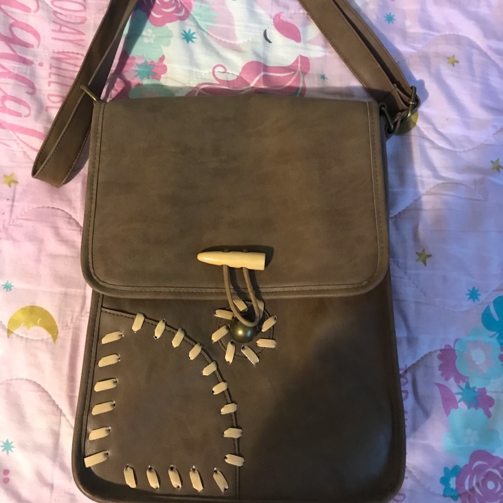 Hot topic Exclusive Disney Flynn rider bag purse